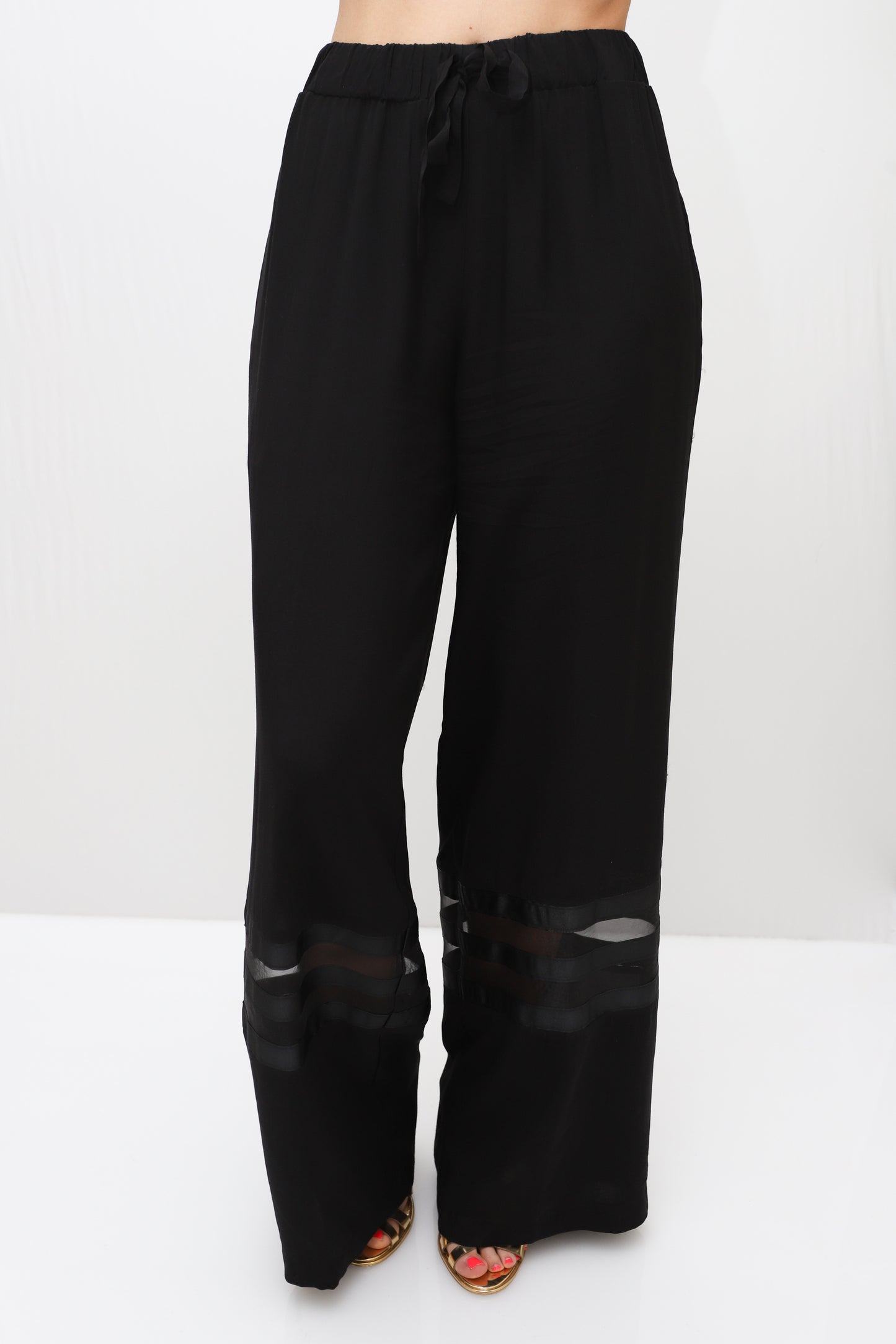 PANTALONES WITH TRANSPARENT STRIPES ACCESS