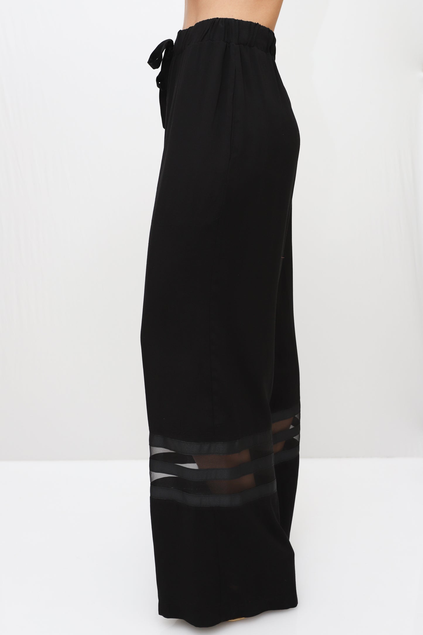 PANTALONES WITH TRANSPARENT STRIPES ACCESS