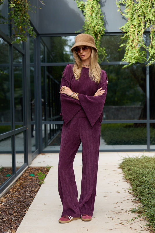 CALÇAS COM APLICAÇÃO SWALLOW