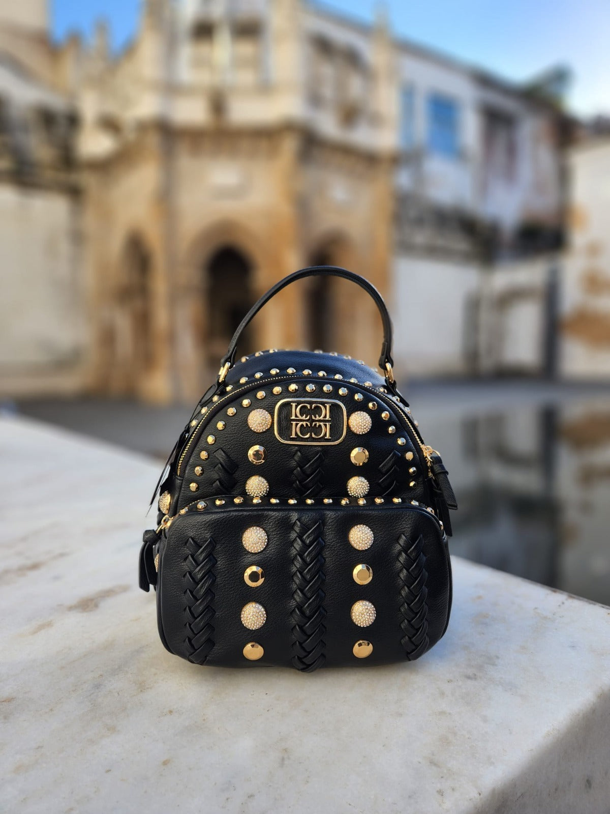 Backpack with studs sale