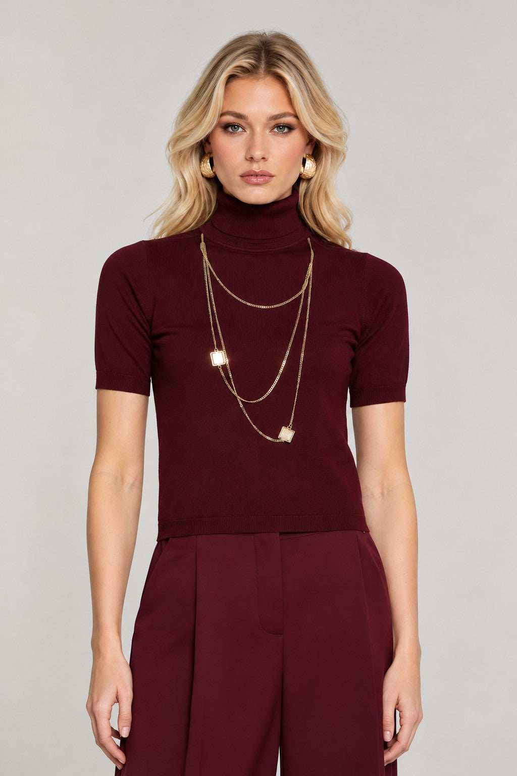 close-up of turtleneck top showing fitted silhouette